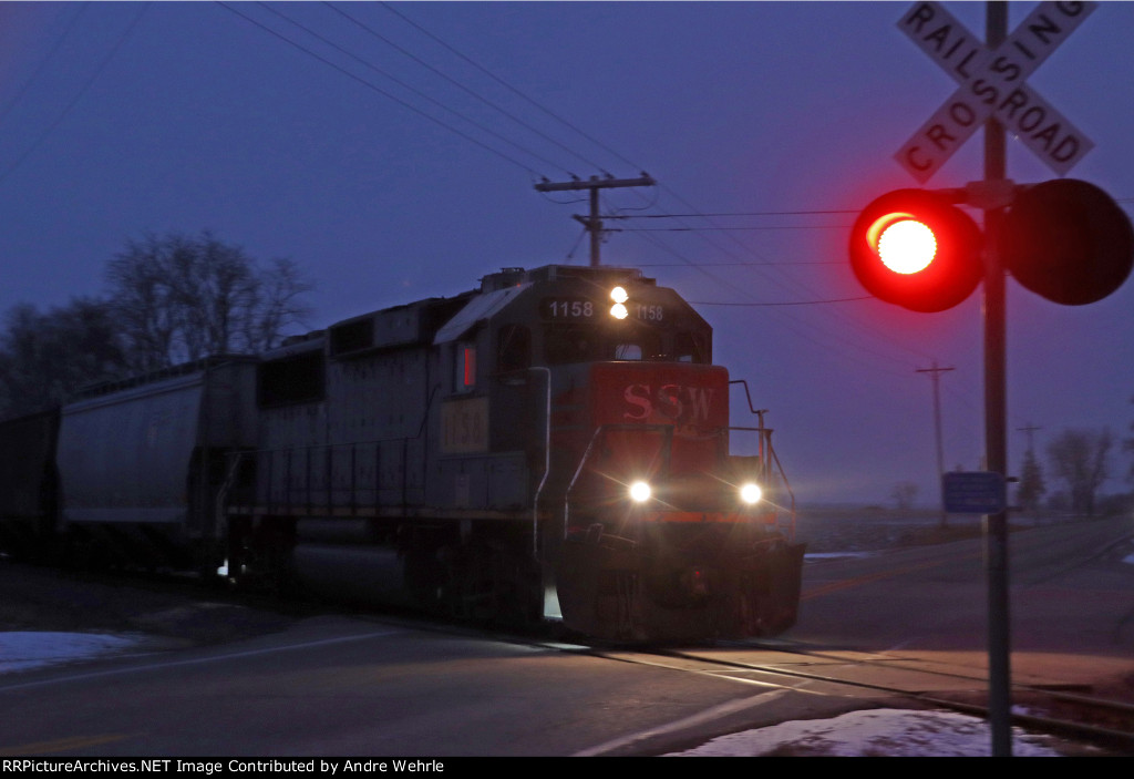 Crossing County J in the blue twilight